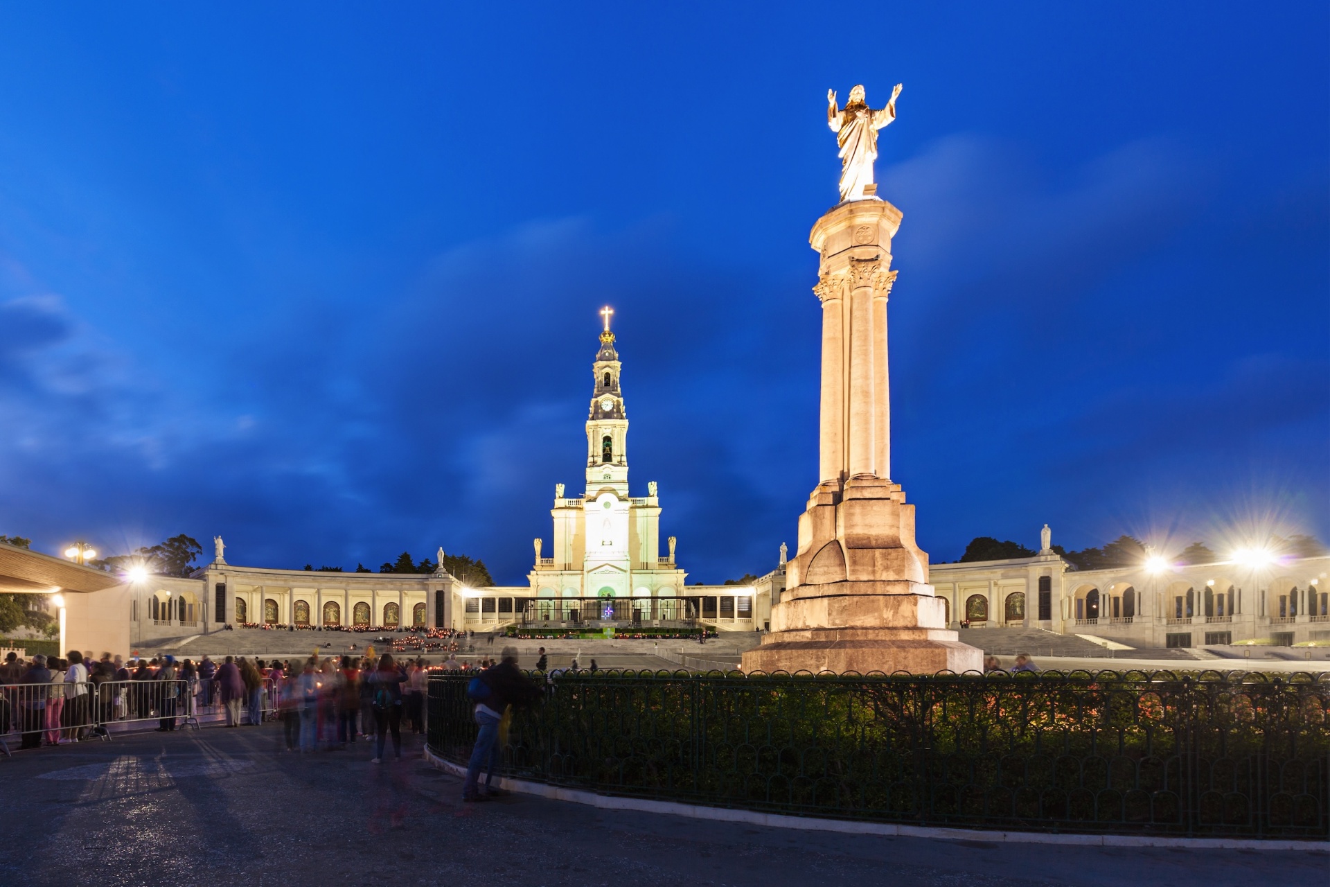 Fátima Sanctuary illuminated at night with Sacred Heart statue